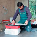 Working with a tile cutter